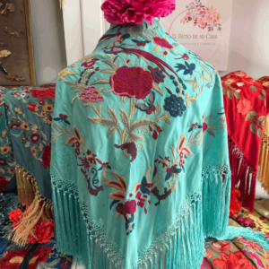 Mantoncillo turquesa de seda con enrejado especia de borlón con rejilla